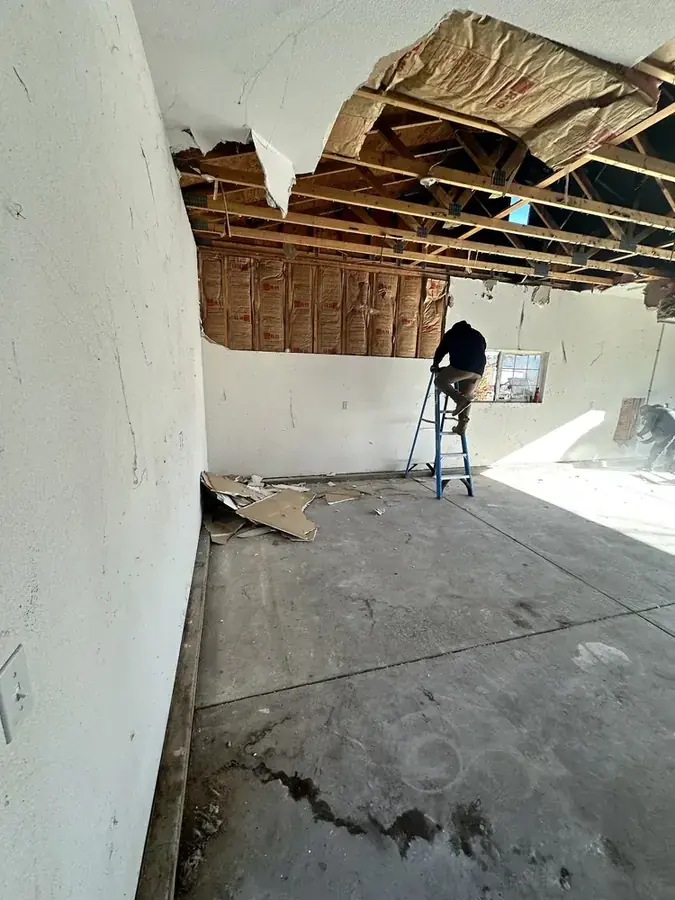 Standing water extracted from a tile floor in a northeast Valley home