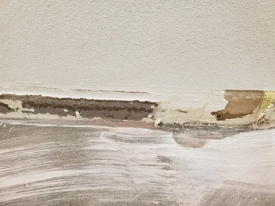 Monsoon roof leak dried in a great room in a northeast Valley home