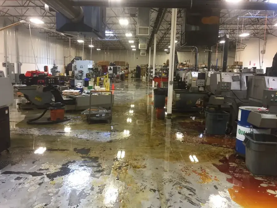 Restoration technician drying a flooded Paradise Valley, AZ home with air movers